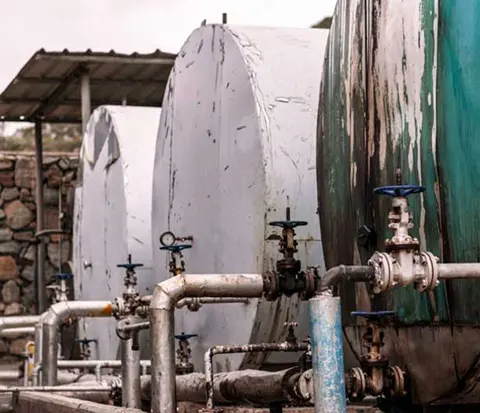 Row of fuel containers in a factory
